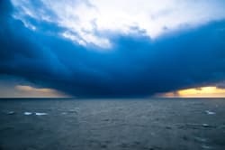 Illustration zum Wetterbegriff Aleutentief